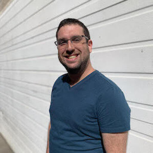 The Man, The Myth, The Legend. Its a photo of me in front of a garage.