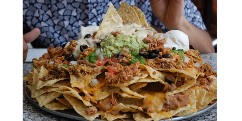 5 pounds of nachos, cheese, meat, and more